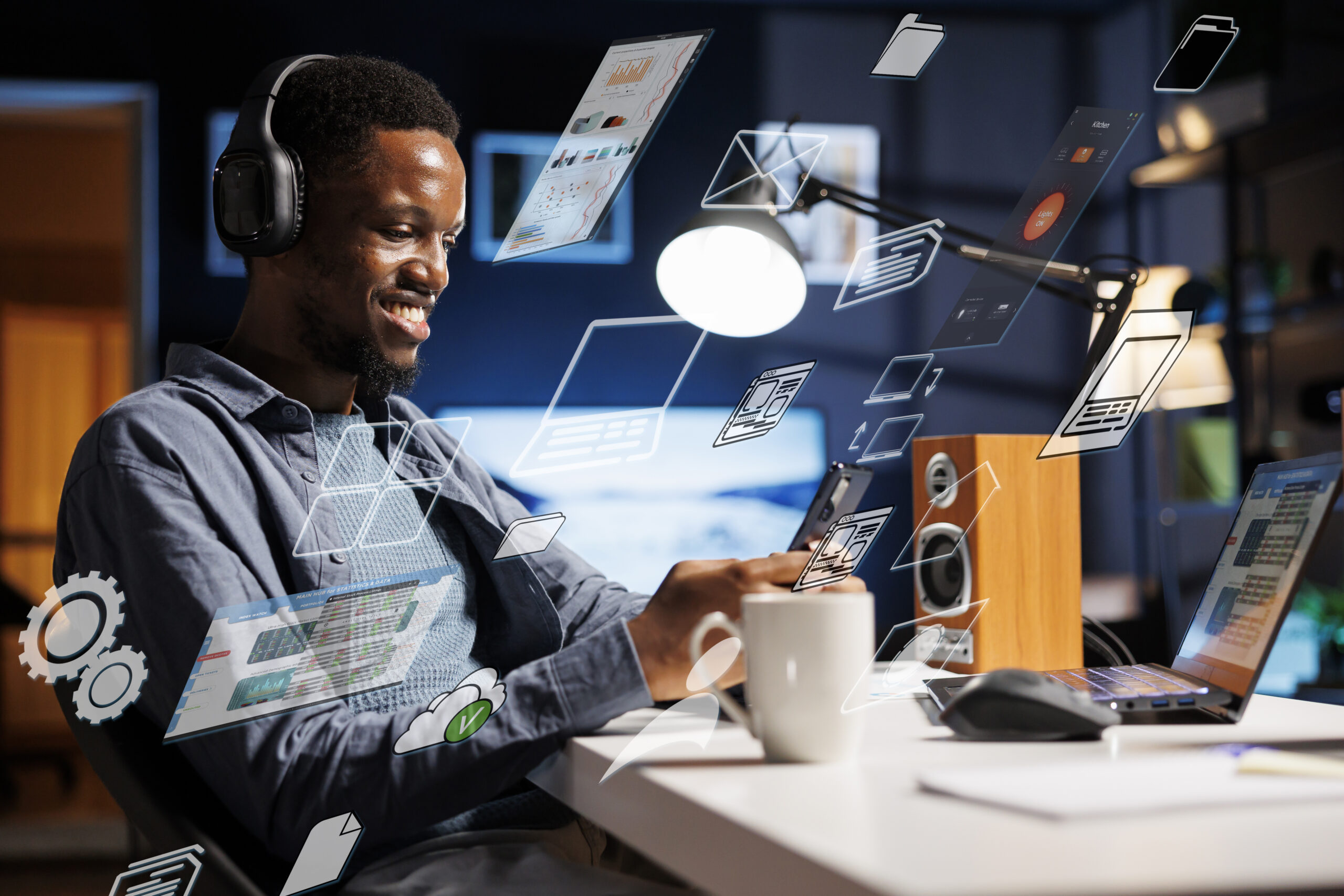 business person using laptop multitasking to finish daily startup tasks